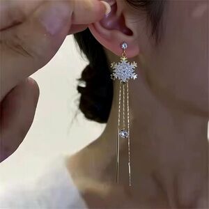 Elegant Gold and Silver Snowflake Dangle Earrings